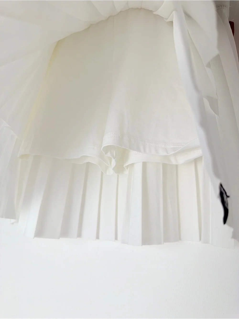 Justice White Asymmetrical Pleated Sport Skirt